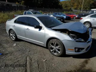 2012 Ford Fusion SE with VIN 3FAHP0HA9CR267305, listed as a Copart auction lot 77114304 with 165,781 mi miles and Salvage Title. Bid and sale history available at carsss.com. Image 4.