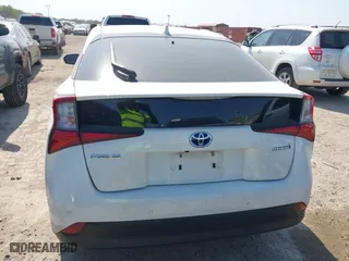 2021 Toyota Prius L Eco with VIN JTDKAMFU6M3141263, listed as a IAAI auction lot 40593951 with 95,921 mi miles. Bid and sale history available at carsss.com. Image 16.