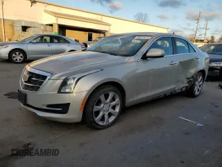 2015 Cadillac ATS Standard AWD with VIN 1G6AG5RX1F0110211, listed as a Copart auction lot 88523615 with 70,214 mi miles and Salvage title. Bid and sale history available at DreamBid. Image 1.