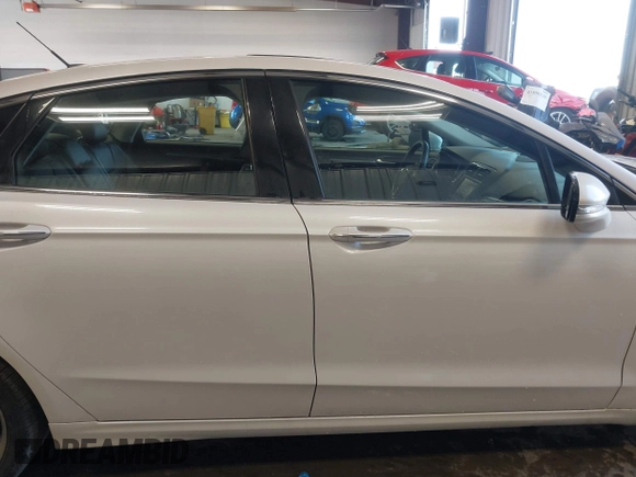 2016 Ford Fusion Titanium z VIN 3FA6P0D93GR116355, wystawiony jako IAAI lot #42158991 z przebiegiem 59 602 mil mil oraz . Historia ofert i sprzedaży dostępna na DreamBid. Obrazek 13.