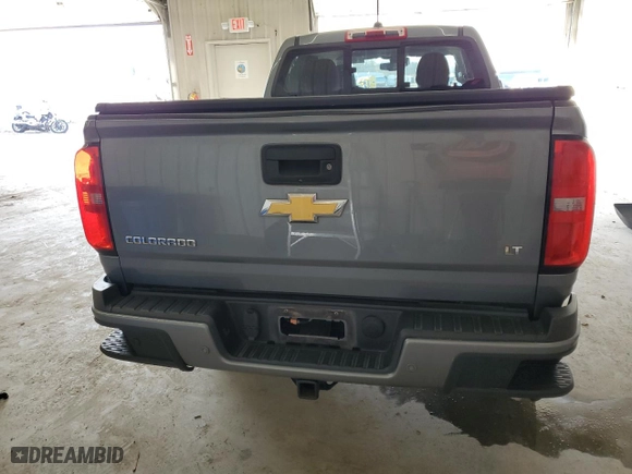 2019 Chevrolet Colorado 4WD LT with VIN 1GCPTCE12K1149290, listed as a Copart auction lot 52755855 with 242,671 mi miles and Clean Title. Bid and sale history available at carsss.com. Image 6.