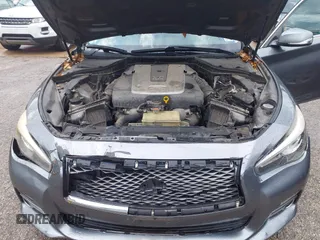 2014 Infiniti Q50 Premium with VIN JN1BV7AP6EM685056, listed as a IAAI auction lot 42188435 with 203,880 mi miles and . Bid and sale history available at carsss.com. Image 10.