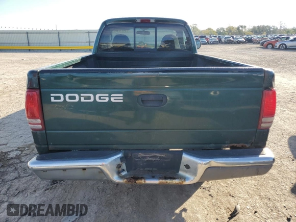 2000 Dodge Dakota z VIN 1B7FL26X5YS793314, wystawiony jako Copart lot #79477744 z przebiegiem 358 319 mil mil oraz Szkoda całkowita • Salvage title. Historia ofert i sprzedaży dostępna na DreamBid. Obrazek 6.