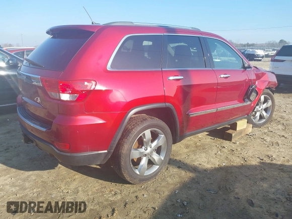 2013 Jeep Grand Cherokee Limited with VIN 1C4RJEBT3DC564366, listed as a IAAI auction lot 41485576 with 153,000 mi miles. Bid and sale history available at carsss.com. Image 4.