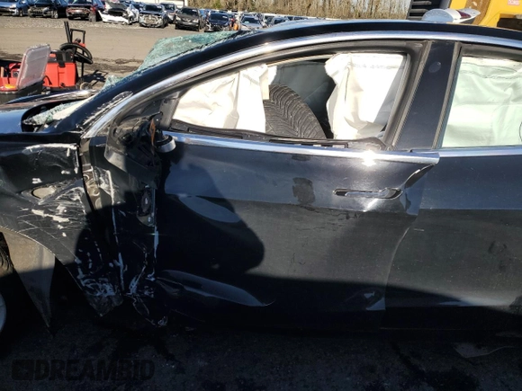 2018 Tesla Model 3 Long Range Battery with VIN 5YJ3E1EB4JF184814, listed as a Copart auction lot 88073115 with Not Provided miles and Salvage Title. Bid and sale history available at DreamBid. Image 7.
