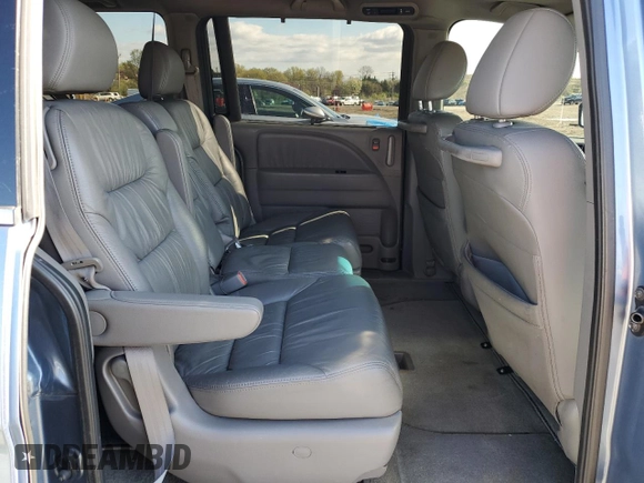 2010 Honda Odyssey EX-L z VIN 5FNRL3H75AB067634, wystawiony jako Copart lot #51538755 z przebiegiem 150 261 mil mil oraz Szkoda całkowita • Salvage title. Historia ofert i sprzedaży dostępna na DreamBid. Obrazek 11.