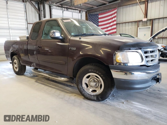 2000 Ford F-150 XL with VIN 1FTZX1726YKB41994, listed as a Copart auction lot 69300034 with Not provided miles and Salvage title. Bid and sale history available at DreamBid. Image 4.