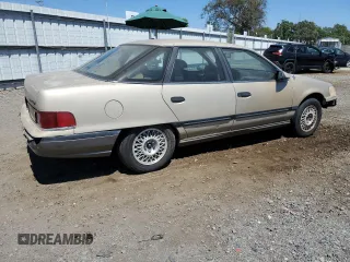 1990 Mercury Sable z VIN 1MECM50U6LG650642, wystawiony jako Copart lot #68279364 z przebiegiem 77 204 mil mil oraz Tytuł czysty. Historia ofert i sprzedaży dostępna na DreamBid. Obrazek 3.