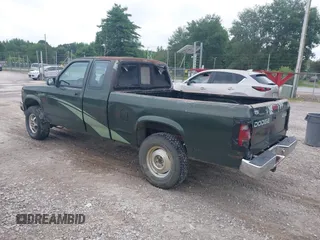 1996 Dodge Dakota z VIN 1B7GG23X1TS548256, wystawiony jako IAAI lot #42488533 z przebiegiem 180 688 mil mil oraz . Historia ofert i sprzedaży dostępna na DreamBid. Obrazek 3.