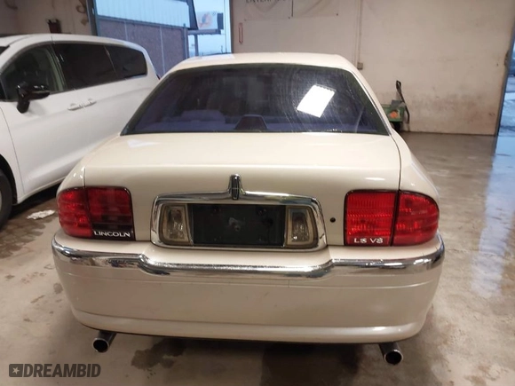 2002 Lincoln LS w/Base Pkg with VIN 1LNHM87AX2Y620293, listed as a IAAI auction lot 41461349 with 129,295 mi miles. Bid and sale history available at carsss.com. Image 16.