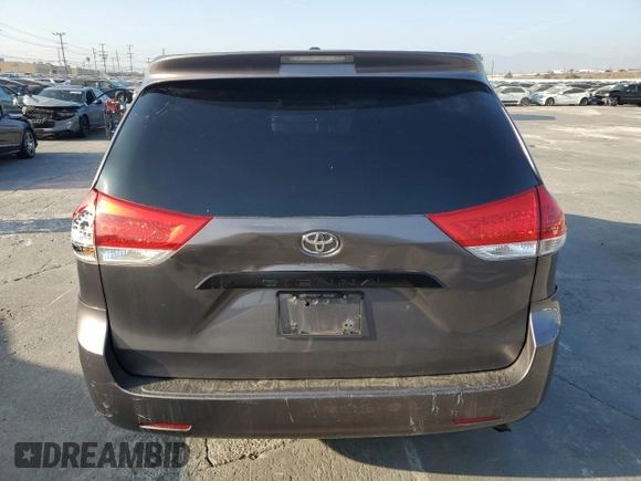 2012 Toyota Sienna with VIN 5TDKA3DC6CS010187, listed as a Copart auction lot 86885234 with 145,745 mi miles and Salvage Title. Bid and sale history available at DreamBid. Image 6.
