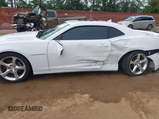 2014 Chevrolet Camaro LT z VIN 2G1FC1E39E9245413, wystawiony jako IAAI lot #42080811 z przebiegiem 88 584 mil mil oraz . Historia ofert i sprzedaży dostępna na DreamBid. Obrazek 6.
