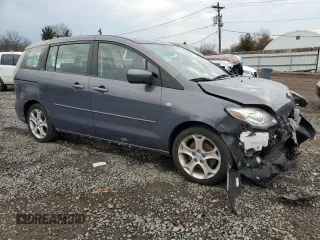 2009 Mazda 5 Sport z VIN JM1CR29L990341258, wystawiony jako Copart lot #45998485 z przebiegiem Nie podano mil oraz Szkoda całkowita • Salvage title. Historia ofert i sprzedaży dostępna na DreamBid. Obrazek 4.