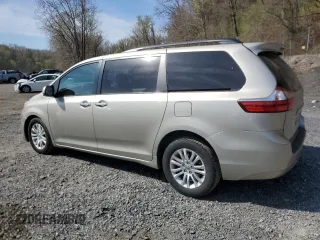 2016 Toyota Sienna XLE with VIN 5TDYK3DC3GS746338, listed as a Copart auction lot 54154025 with 105,994 mi miles and Salvage Title. Bid and sale history available at carsss.com. Image 2.