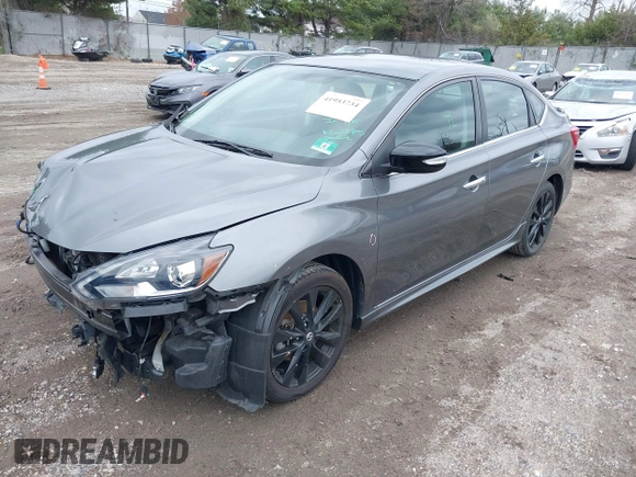 2018 Nissan Sentra S with VIN 3N1AB7AP5JY252405, listed as a IAAI auction lot 41953734 with 26,181 mi miles and . Bid and sale history available at DreamBid. Image 2.