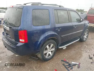 2013 Honda Pilot Touring with VIN 5FNYF4H95DB007125, listed as a IAAI auction lot 42493693 with Not provided miles and . Bid and sale history available at DreamBid. Image 4.