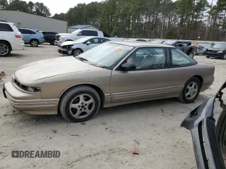 1997 Oldsmobile Cutlass Supreme S z VIN 1G3WH12MXVF305924, wystawiony jako Copart lot #47929345 z przebiegiem 85 967 mil mil oraz Szkoda całkowita • Salvage title. Historia ofert i sprzedaży dostępna na DreamBid. Obrazek 1.