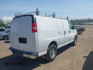 2019 Chevrolet Express Cargo with VIN 1GCWGAFP3K1249390, listed as a IAAI auction lot 42101049 with 82,211 mi miles. Bid and sale history available at carsss.com. Image 4.