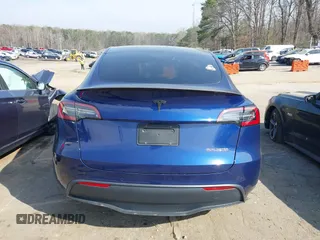 2022 Tesla Model Y Performance with VIN 7SAYGDEF7NF497076, listed as a IAAI auction lot 41759793 with 46,970 mi miles and . Bid and sale history available at DreamBid. Image 16.