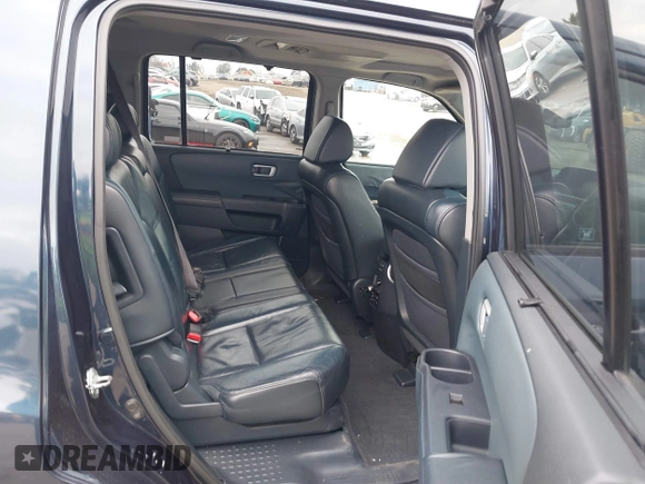 2009 Honda Pilot Touring with VIN 5FNYF48929B040199, listed as a IAAI auction lot 41466006 with 167,959 mi miles and . Bid and sale history available at carsss.com. Image 8.