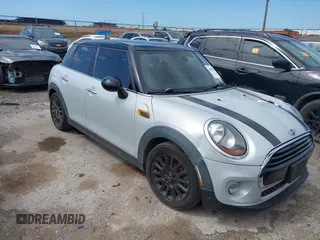 2016 MINI Hardtop 4 Door z VIN WMWXU1C56G2D08269, wystawiony jako IAAI lot #42099566 z przebiegiem 76 324 mil mil oraz . Historia ofert i sprzedaży dostępna na DreamBid. Obrazek 1.