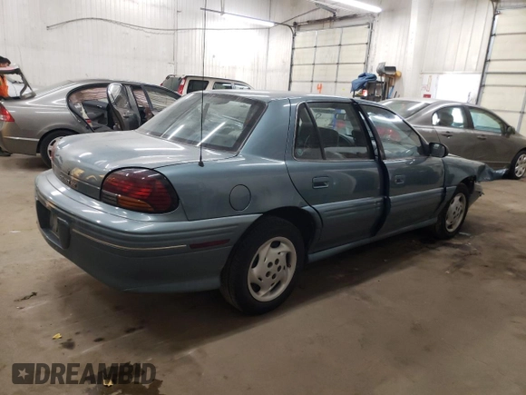 1997 Pontiac Grand Am SE with VIN 1G2NE52M8VC721326, listed as a Copart auction lot 75860034 with 110,209 mi miles and Salvage title. Bid and sale history available at DreamBid. Image 3.