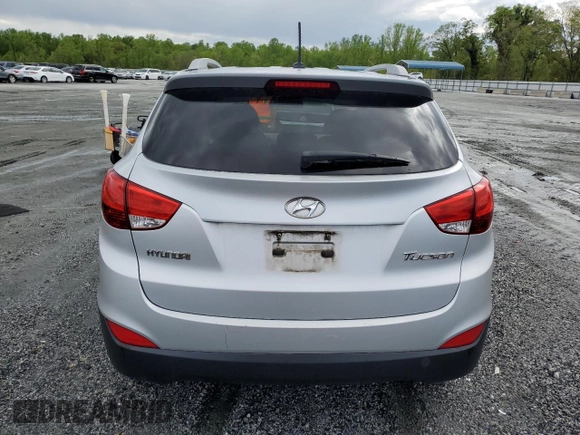 2013 Hyundai Tucson GLS with VIN KM8JU3AC1DU709937, listed as a Copart auction lot 52716295 with 181,711 mi miles and Salvage Title. Bid and sale history available at carsss.com. Image 6.