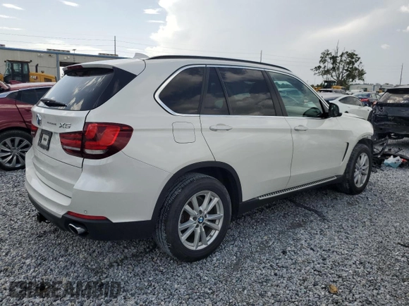 2015 BMW X5 xDrive35i z VIN 5UXKR0C58F0P03231, wystawiony jako Copart lot #60964305 z przebiegiem 71 419 mil mil oraz Szkoda całkowita • Salvage title. Historia ofert i sprzedaży dostępna na DreamBid. Obrazek 3.