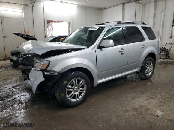 2010 Mercury Mariner Premier with VIN 4M2CN8HG4AKJ10385, listed as a Copart auction lot 70435004 with 133,615 mi miles and Salvage Title. Bid and sale history available at carsss.com. Image 1.