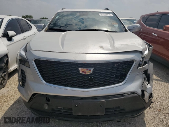 2022 Cadillac XT4 FWD Sport with VIN 1GYFZER47NF111047, listed as a Copart auction lot 50958135 with 14,448 mi miles and Salvage Title. Bid and sale history available at carsss.com. Image 5.