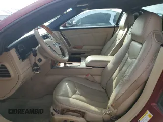 2007 Cadillac XLR z VIN 1G6YV36A575601135, wystawiony jako Copart lot #75123444 z przebiegiem Nie podano mil oraz Szkody całkowita. Historia ofert i sprzedaży dostępna na DreamBid. Obrazek 7.