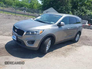 2016 Kia Sorento LX with VIN 5XYPGDA52GG044582, listed as a IAAI auction lot 42402596 with 143,250 mi miles and . Bid and sale history available at DreamBid. Image 2.