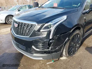 2021 Cadillac XT5 AWD Premium Luxury with VIN 1GYKNDRS0MZ135660, listed as a IAAI auction lot 41123089 with 26,361 mi miles. Bid and sale history available at carsss.com. Image 6.