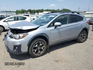 2018 Subaru Crosstrek Premium z VIN JF2GTADC4J8277058, wystawiony jako Copart lot #60571485 z przebiegiem 54 129 mil mil oraz Szkoda całkowita • Salvage title. Historia ofert i sprzedaży dostępna na DreamBid. Obrazek 1.