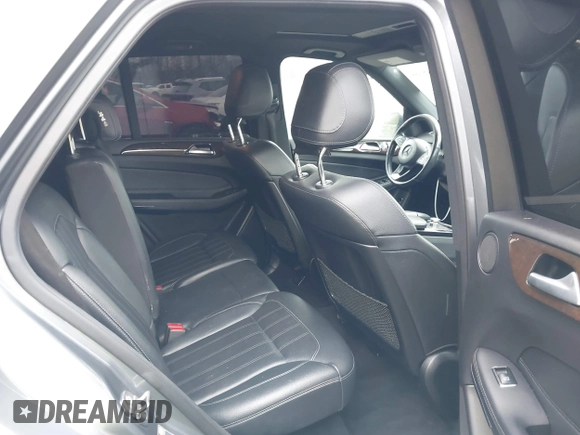 2018 Mercedes-Benz GLE 350 with VIN 4JGDA5HB3JB064259, listed as a IAAI auction lot 41502169 with 111,196 mi miles and . Bid and sale history available at DreamBid. Image 8.