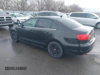 2014 Volkswagen Jetta SE with VIN 3VWD17AJXEM370663, listed as a IAAI auction lot 41612207 with 135,215 mi miles and . Bid and sale history available at DreamBid. Image 3.