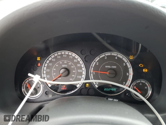 2006 Jeep Liberty Limited z VIN 1J4GL58K66W241358, wystawiony jako Copart lot #59708575 z przebiegiem 202 960 mil mil oraz Szkoda całkowita • Salvage title. Historia ofert i sprzedaży dostępna na DreamBid. Obrazek 9.