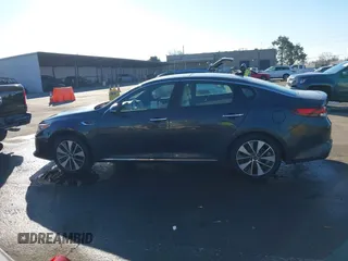 2016 Kia Optima SXL Turbo with VIN 5XXGV4L2XGG051938, listed as a IAAI auction lot 41400484 with 114,722 mi miles. Bid and sale history available at carsss.com. Image 14.
