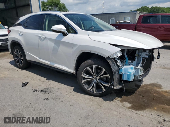 2019 Lexus RX 350 with VIN JTJBZMCA1K2041526, listed as a Copart auction lot 60991095 with 42,644 mi miles and Salvage title. Bid and sale history available at DreamBid. Image 4.