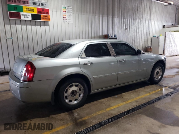 2005 Chrysler 300 with VIN 2C3JA53G65H556313, listed as a Copart auction lot 51839305 with 124,358 mi miles and Salvage Title. Bid and sale history available at carsss.com. Image 3.