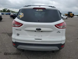 2013 Ford Escape SE with VIN 1FMCU9GX6DUD15646, listed as a Copart auction lot 59351195 with 185,667 mi miles and Salvage title. Bid and sale history available at DreamBid. Image 6.
