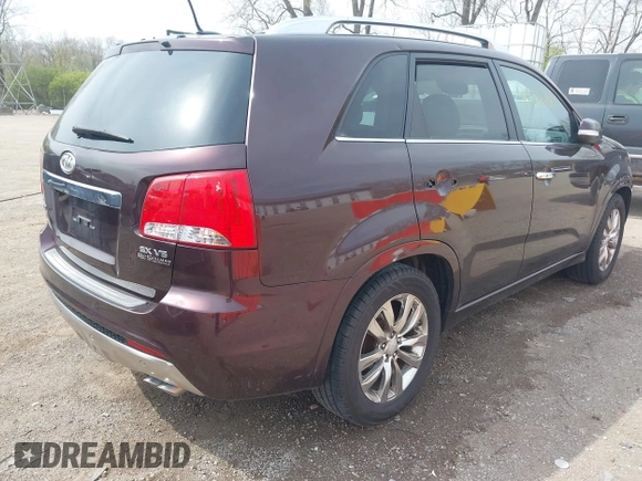 2012 Kia Sorento SX with VIN 5XYKW4A2XCG187647, listed as a IAAI auction lot 42020667 with 210,689 mi miles. Bid and sale history available at carsss.com. Image 4.