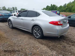 2013 Infiniti M with VIN JN1BY1AR3DM601425, listed as a IAAI auction lot 42238952 with 180,023 mi miles and . Bid and sale history available at DreamBid. Image 3.