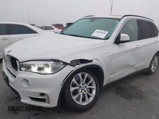 2016 BMW X5 xDrive40e with VIN 5UXKT0C59G0S79593, listed as a IAAI auction lot 41846666 with 57,178 mi miles and . Bid and sale history available at DreamBid. Image 6.