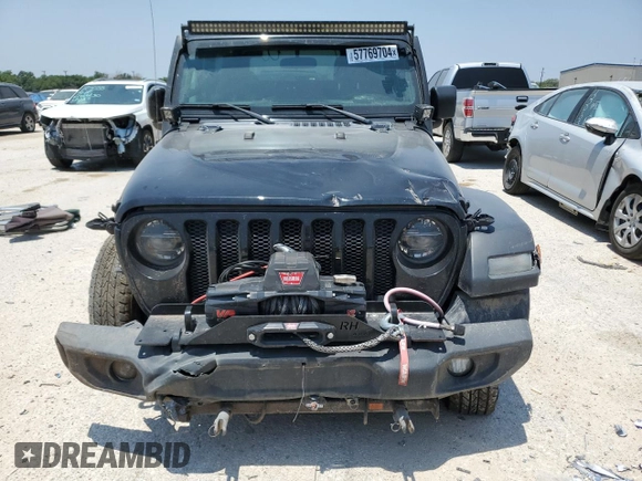 2020 Jeep Wrangler Sport with VIN 1C4GJXAGXLW237080, listed as a Copart auction lot 57769704 with 144,137 mi miles and Salvage title. Bid and sale history available at DreamBid. Image 5.