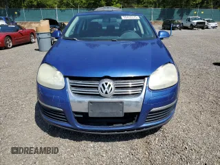2008 Volkswagen Jetta SE z VIN 3VWRM71KX8M141684, wystawiony jako Copart lot #59432375 z przebiegiem 171 936 mil mil oraz Czysty tytuł • Clean title. Historia ofert i sprzedaży dostępna na DreamBid. Obrazek 5.