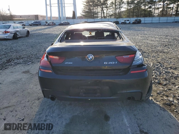 2017 BMW 6 Series z VIN WBA6D2C38HGT73237, wystawiony jako Copart lot #40849343 z przebiegiem 49 513 mil mil oraz . Historia ofert i sprzedaży dostępna na DreamBid. Obrazek 6.