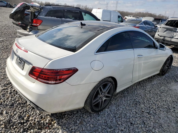 2016 Mercedes-Benz E-Class E 400 with VIN WDDKJ6FB0GF348458, listed as a Copart auction lot 87701385 with 124,867 mi miles and Salvage Title. Bid and sale history available at carsss.com. Image 3.