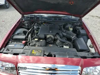 2003 Ford Crown Victoria LX z VIN 2FAFP74W43X100336, wystawiony jako Copart lot #51004035 z przebiegiem 82 089 mil mil oraz Szkoda całkowita • Salvage title. Historia ofert i sprzedaży dostępna na DreamBid. Obrazek 11.