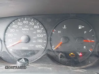 2005 Dodge Neon SE with VIN 1B3ES26C35D205066, listed as a IAAI auction lot 41943955 with 129,821 mi miles. Bid and sale history available at carsss.com. Image 7.